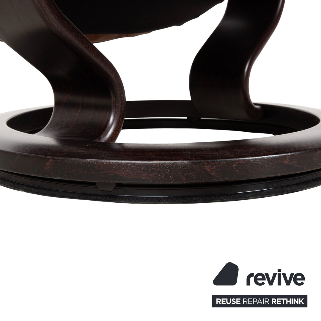 Fauteuil et repose-pieds Stressless Consul en cuir cognac, fonction relax