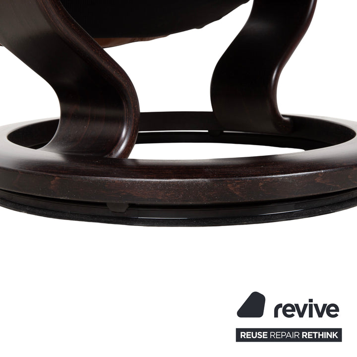 Fauteuil et repose-pieds Stressless Consul en cuir cognac, fonction relax