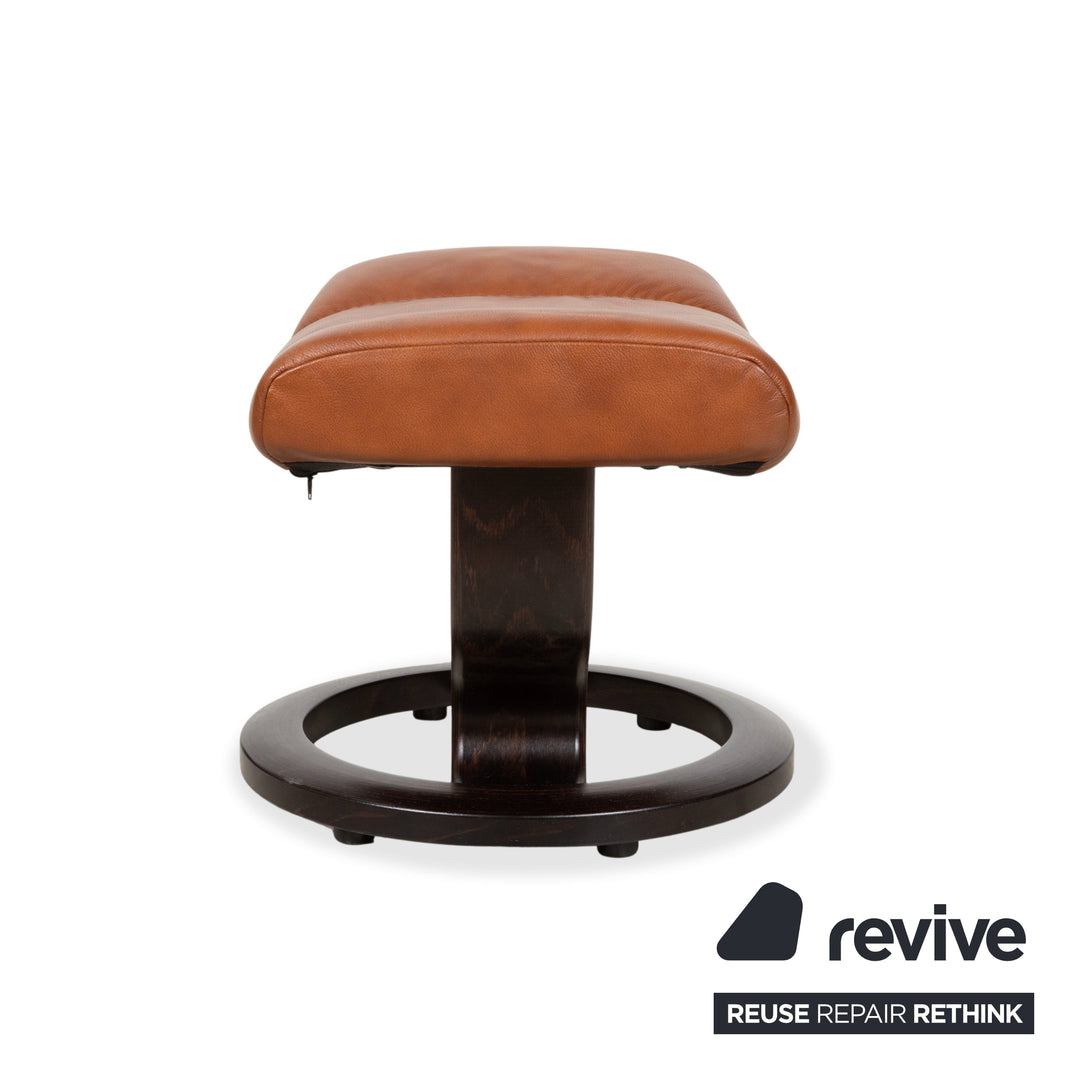 Fauteuil et repose-pieds Stressless Consul en cuir cognac, fonction relax