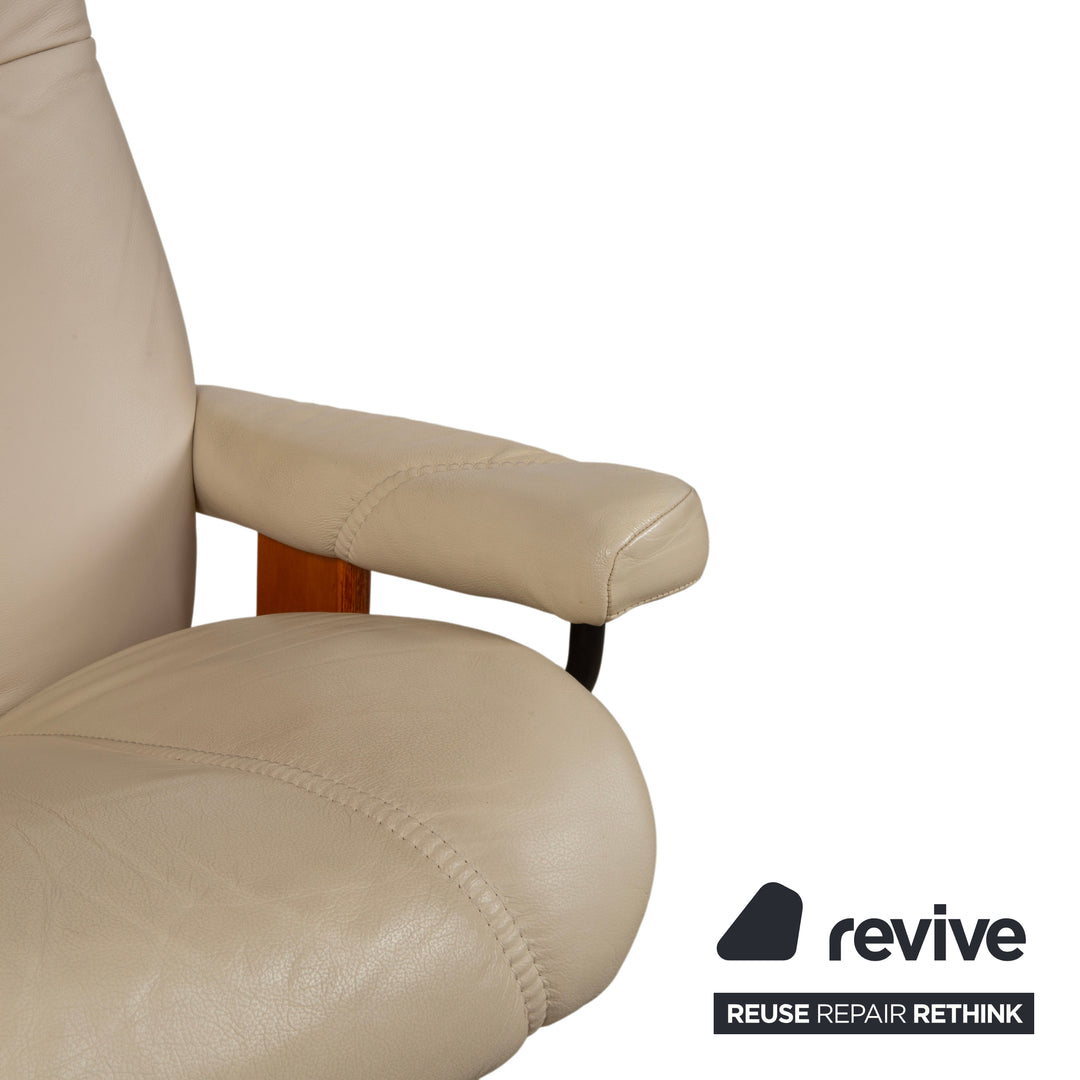 Fauteuil Stressless Consul en cuir crème beige avec pouf fonction manuelle relaxation
