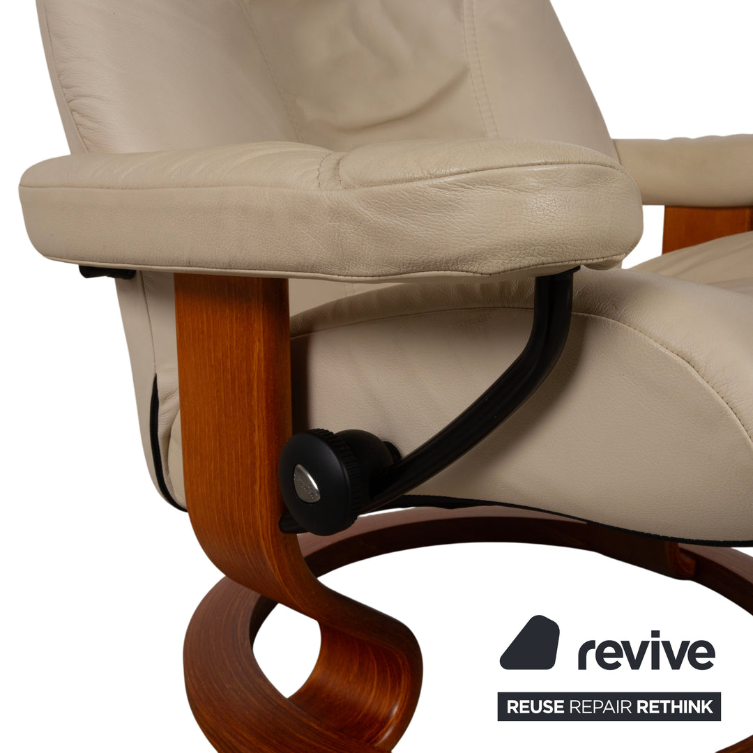 Fauteuil Stressless Consul en cuir crème beige avec pouf fonction manuelle relaxation