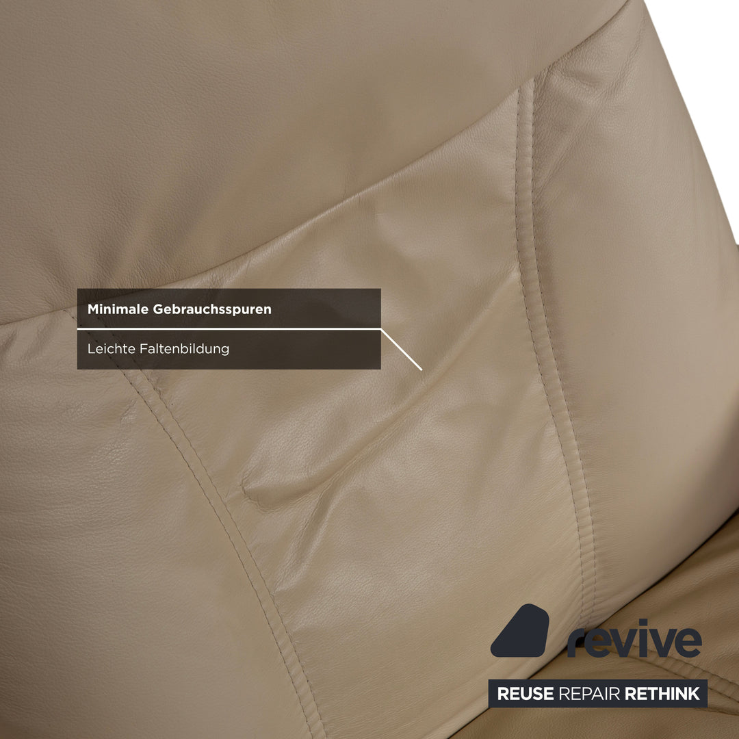 Fauteuil Stressless Consul en cuir crème beige avec pouf fonction manuelle relaxation
