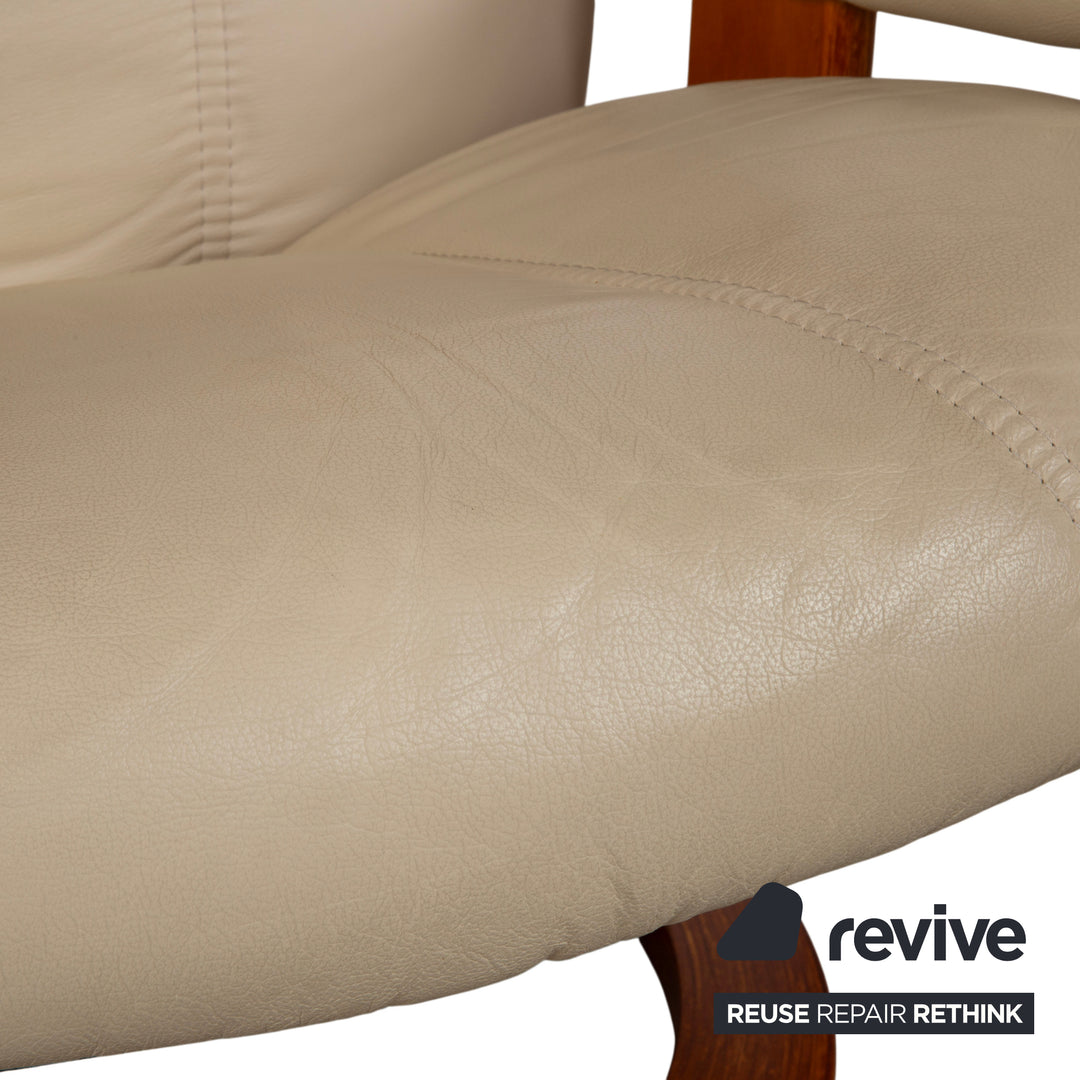 Fauteuil Stressless Consul en cuir crème beige avec pouf fonction manuelle relaxation