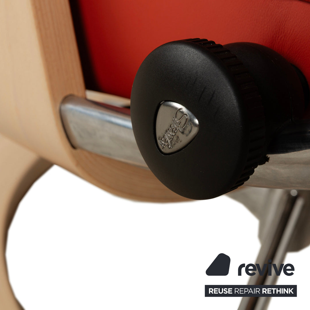 Fauteuil Stressless View en cuir rouge orange, fonction manuelle, y compris la fonction de relaxation du tabouret