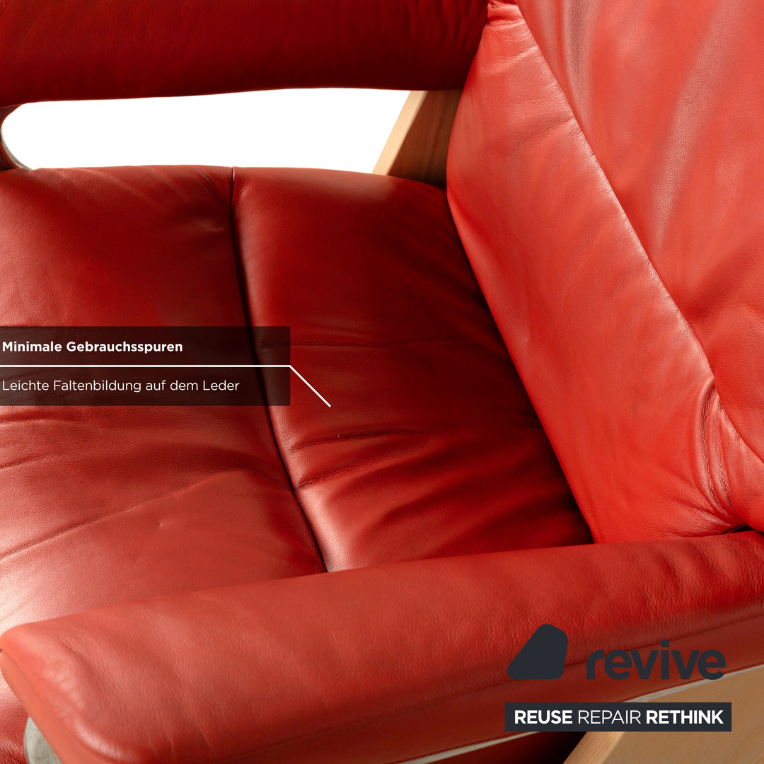 Fauteuil Stressless View en cuir rouge orange, fonction manuelle, y compris la fonction de relaxation du tabouret