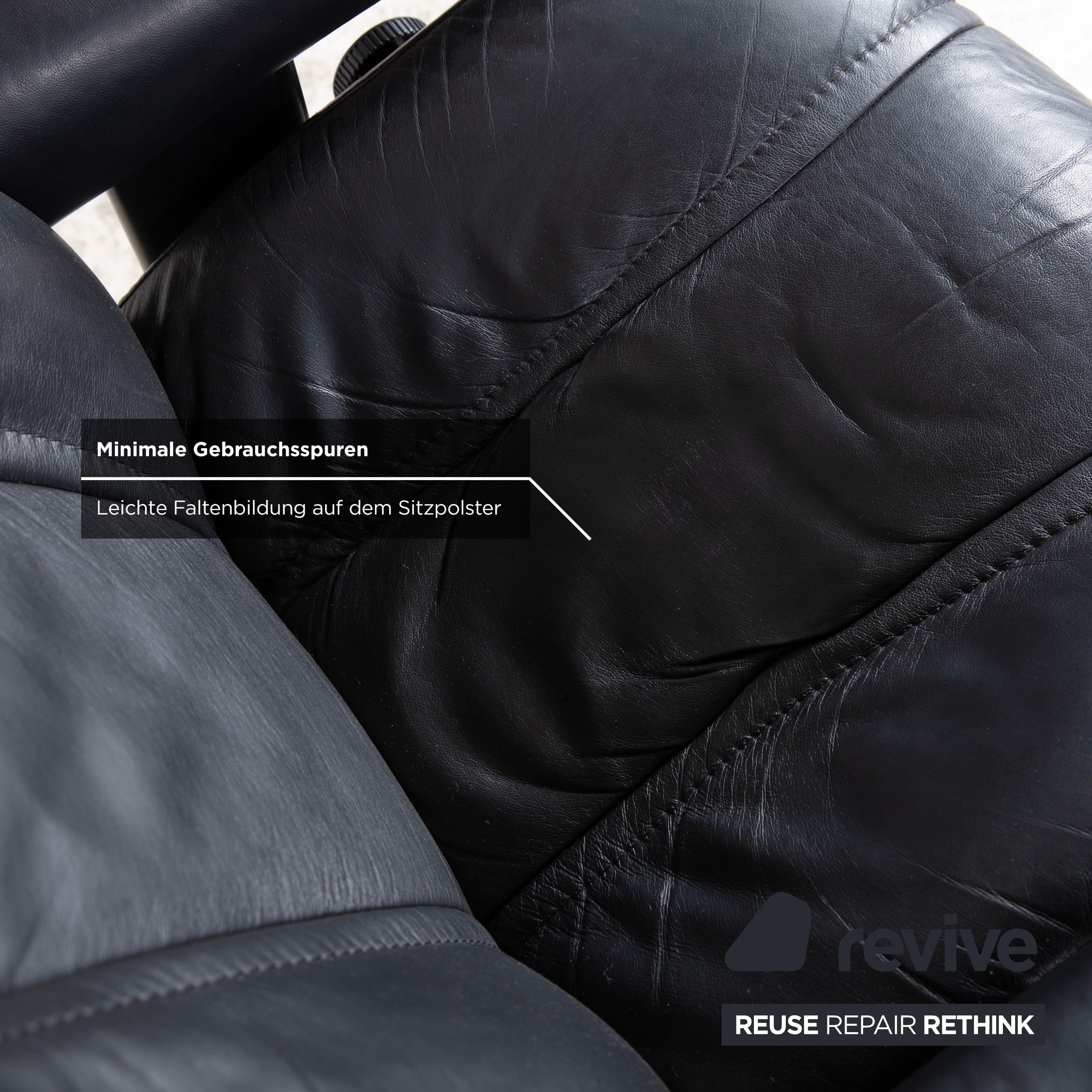 Fauteuil en cuir Stressless Wing noir avec fonction manuelle du tabouret