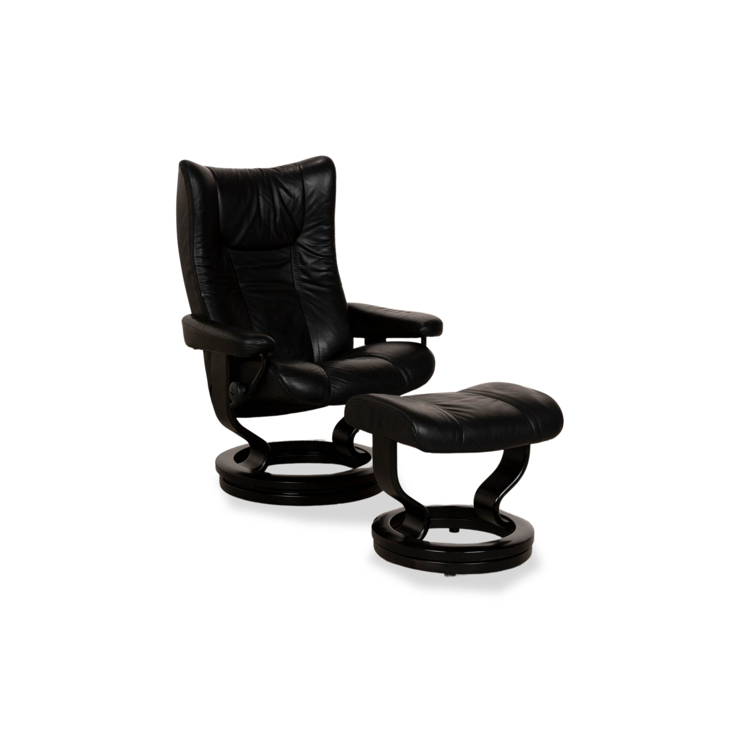 Fauteuil en cuir Stressless Wing noir fonction manuelle avec tabouret