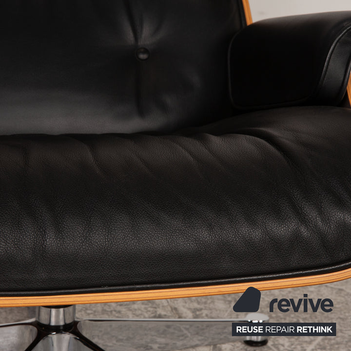 Vitra Eames Lounge Chair avec fauteuil ottoman en cuir noir Fonction