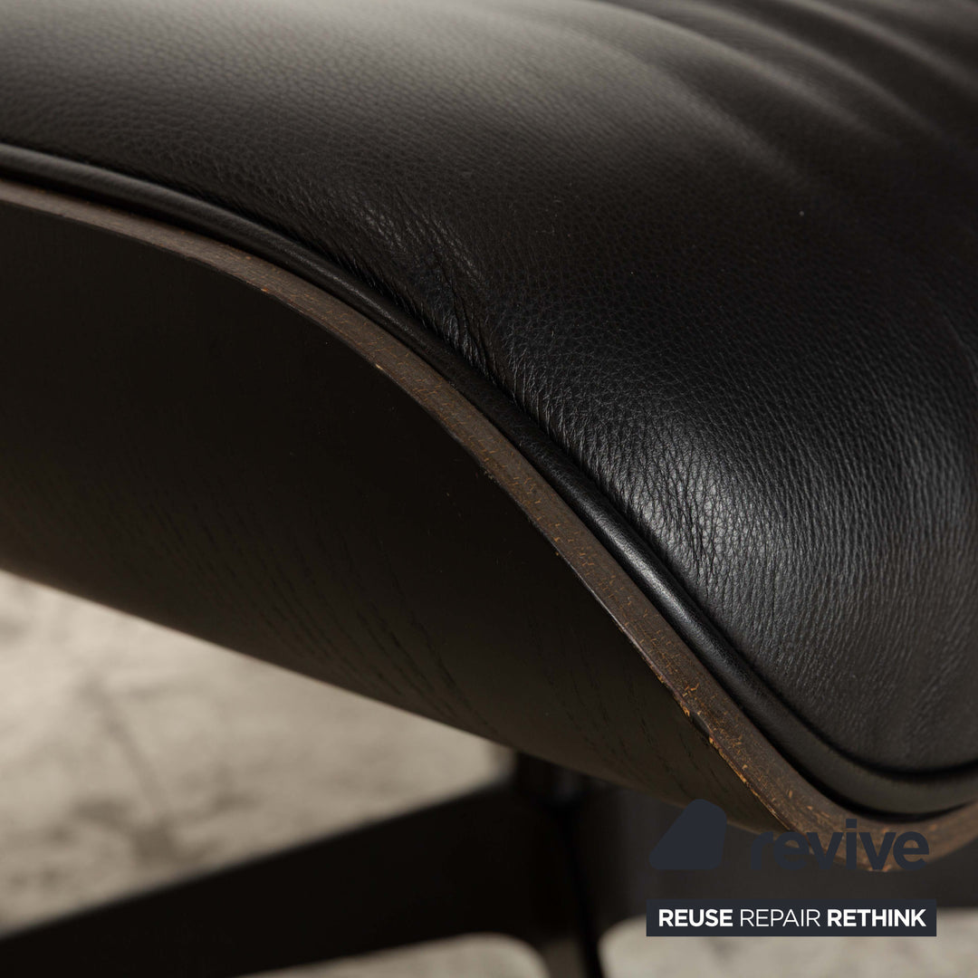 Fauteuil Vitra Eames Lounge Chair en cuir avec ottoman noir, fonction manuelle