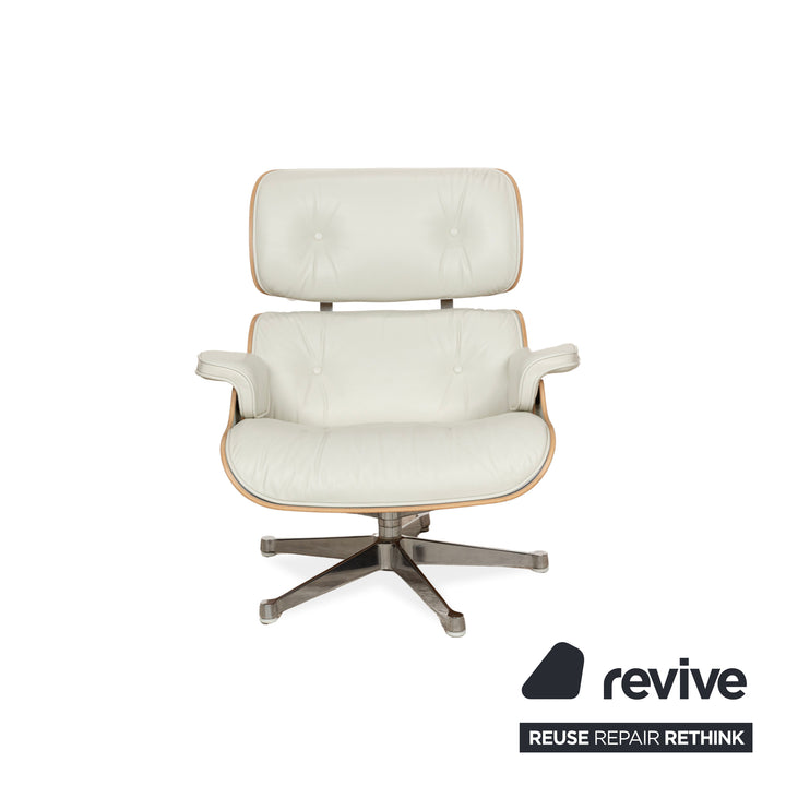 Fauteuil Lounge Vitra Eames en cuir et bois blanc avec repose-pieds