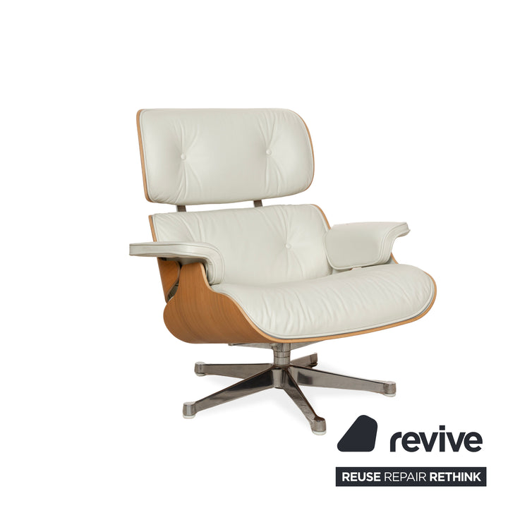 Fauteuil Lounge Vitra Eames en cuir et bois blanc avec repose-pieds