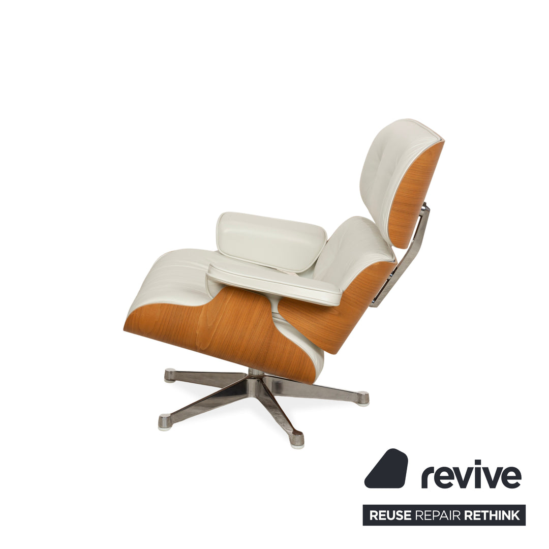 Fauteuil Lounge Vitra Eames en cuir et bois blanc avec repose-pieds