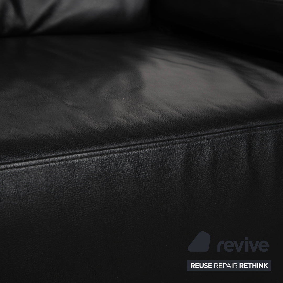 Canapé deux places en cuir noir Willi Schillig - Fonctionnement manuel