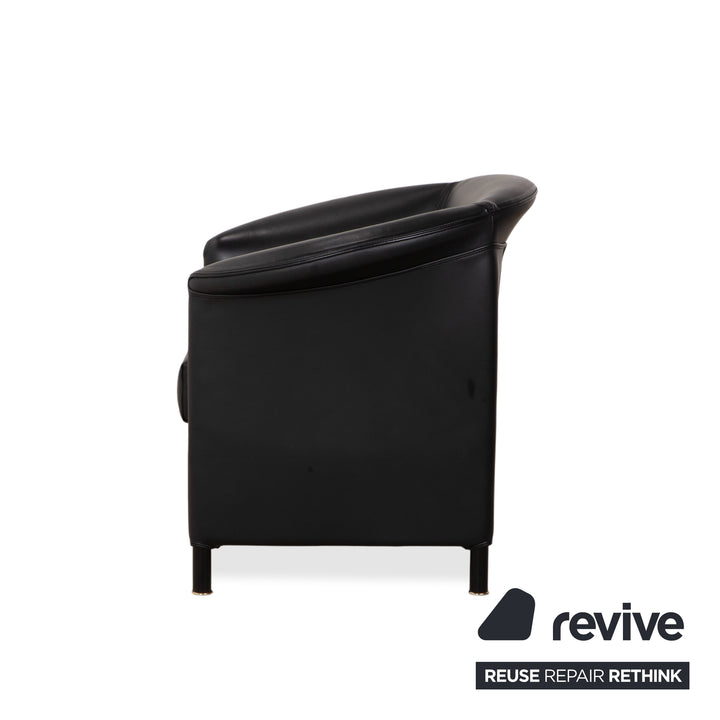 Wittmann Aura Leder Sessel Schwarz Messingkappen