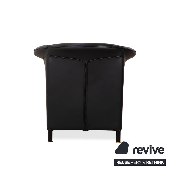 Wittmann Aura Leder Sessel Schwarz Messingkappen