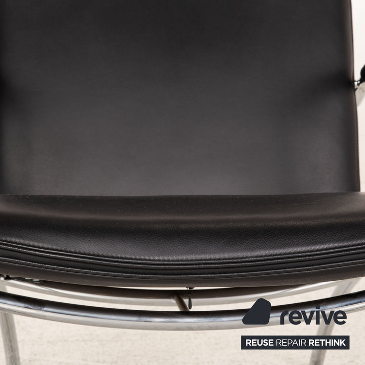 Cor Pando Leder Sessel Schwarz inkl. Hocker