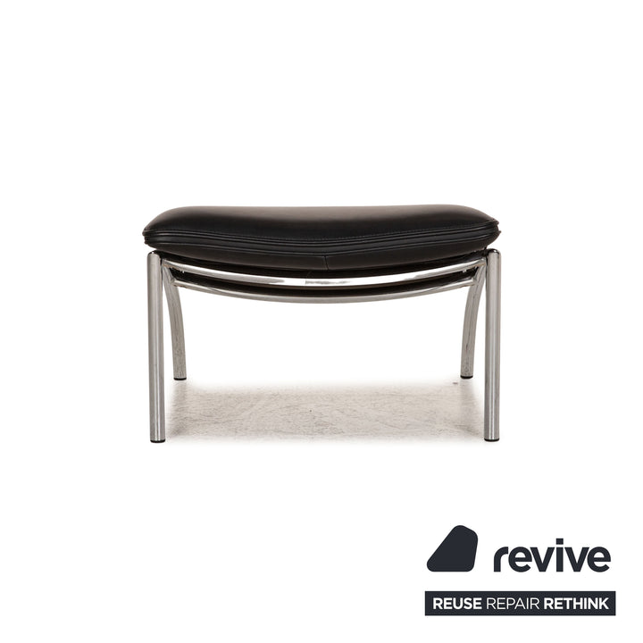 Cor Pando Leder Sessel Schwarz inkl. Hocker