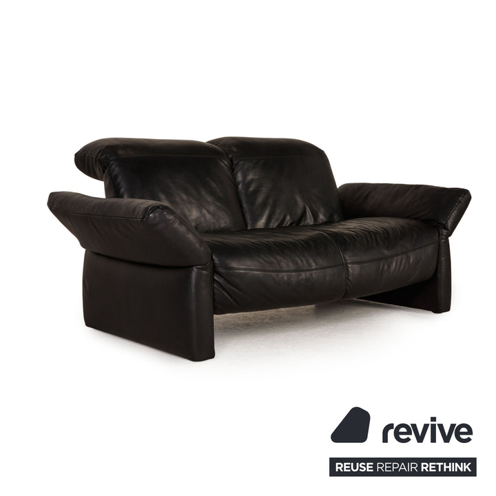 Koinor Elena leather sofa black two-seater couch relax function
