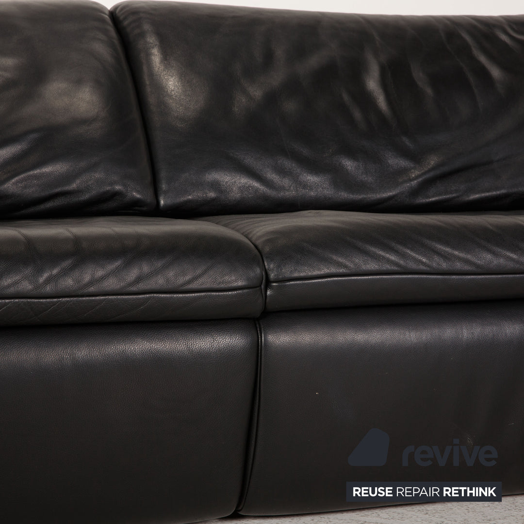Koinor Evento leather sofa black two-seater couch function relax function